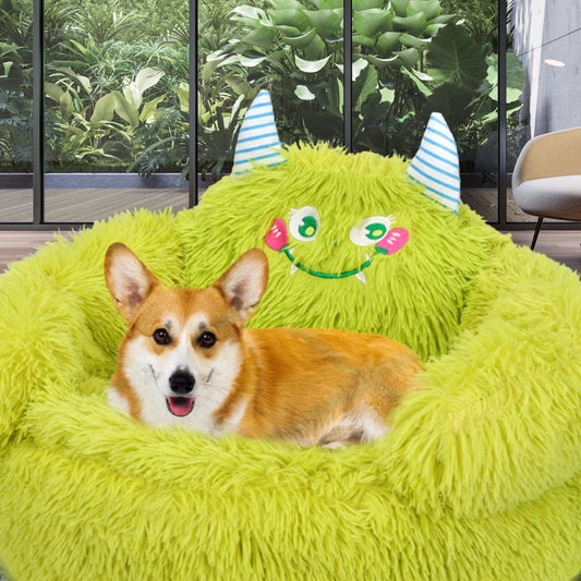 Corgi installé majestueusement sur un canapé chien Momo élégant et raffiné