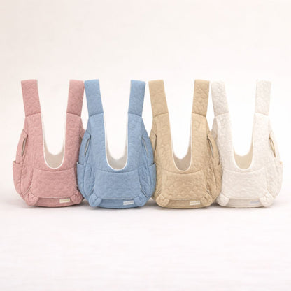 Sac ventral pour chien disponible en quatre couleurs pastel : rose, bleu, blanc et beige