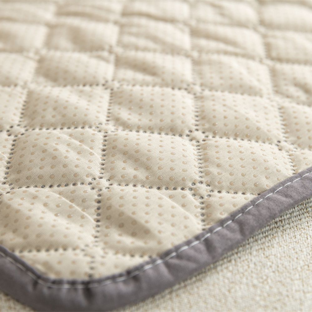 Tapis chien lavable avec face antidérapante assurant une bonne stabilité au sol et un usage sécurisé