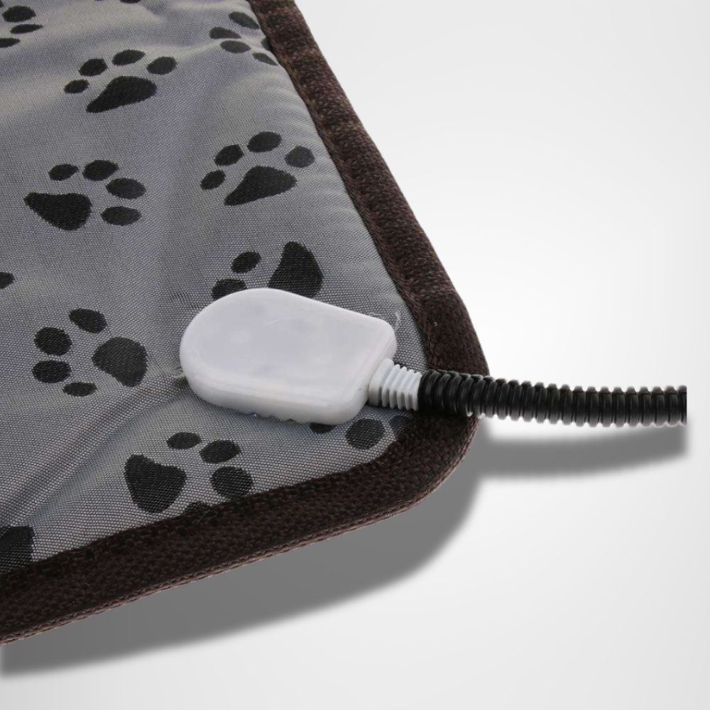 détail du tapis pour chien chauffant avec câble renforcé et système sécurisé