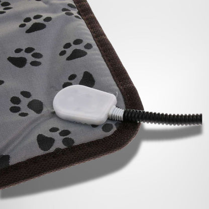 détail du tapis pour chien chauffant avec câble renforcé et système sécurisé